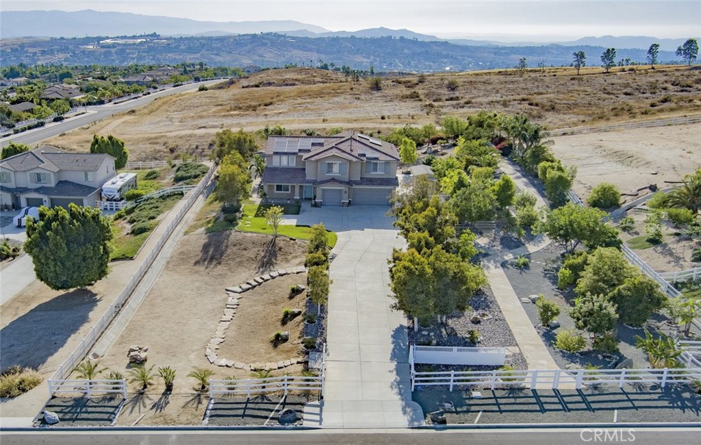 17465 Fairbreeze Court Riverside, CA 92504 - Photo 6 of 30 an aerial view of a house with a mountain