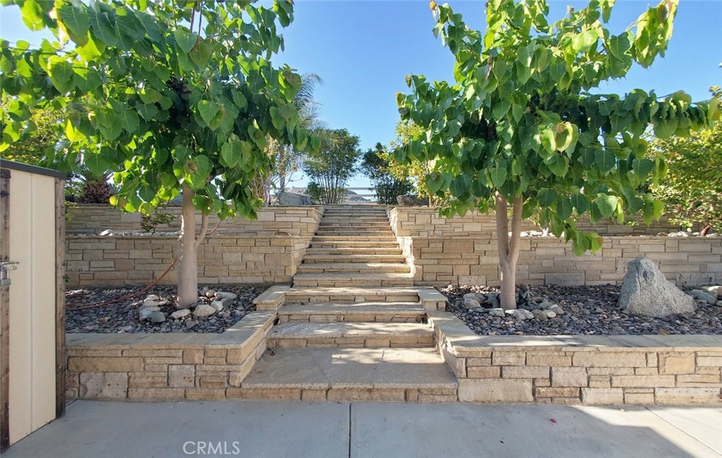 17465 Fairbreeze Court Riverside, CA 92504 - Photo 9 of 30 a view of a pathway of a house