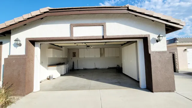 a view of a house with garage