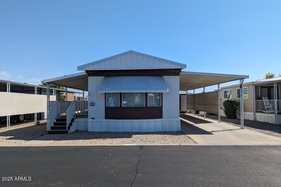 a view of a terrace with wooden fence