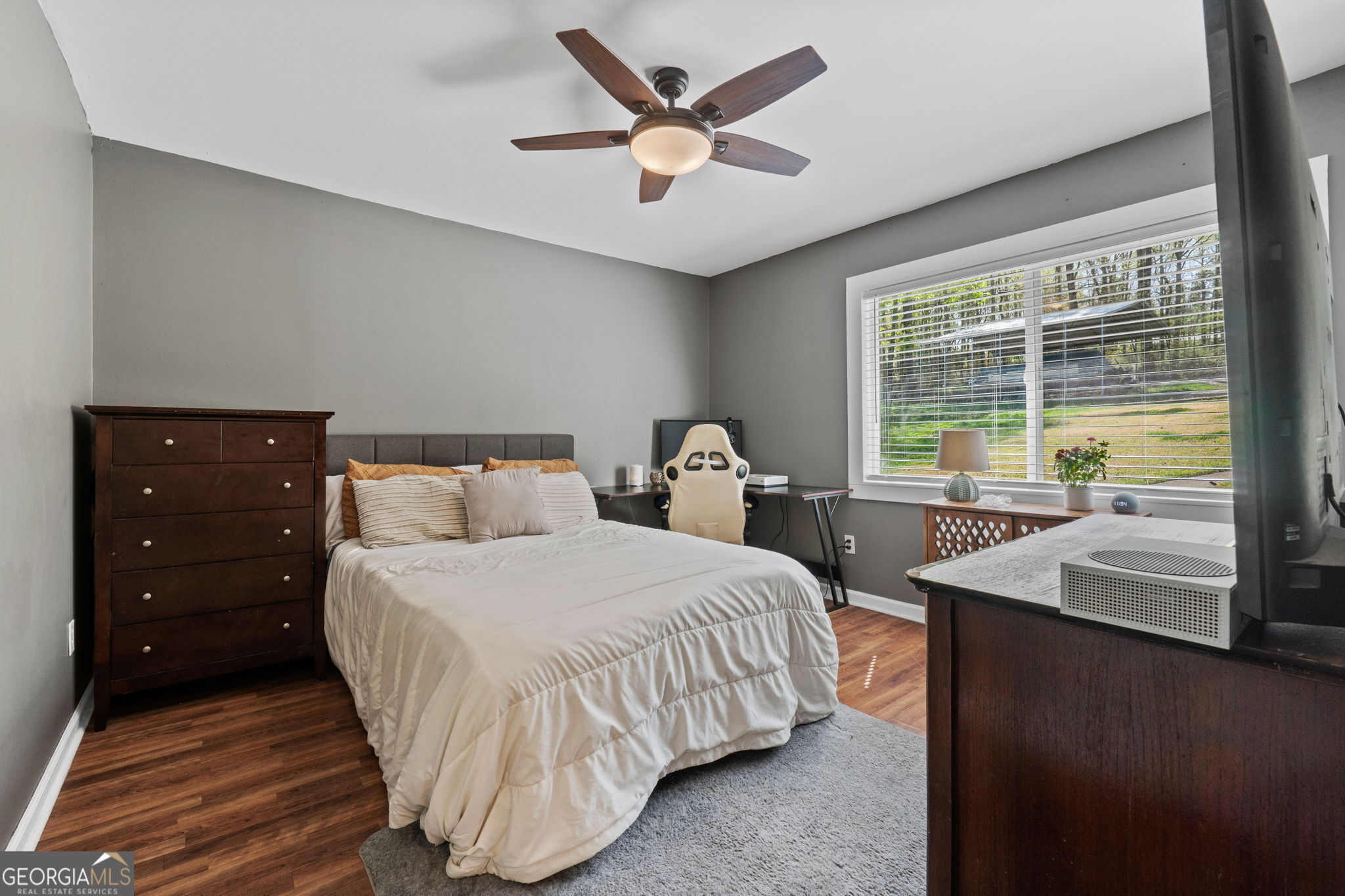 532 Henry Higgins Road Jackson, GA 30233 - Photo 15 of 46 a bedroom with a bed and window