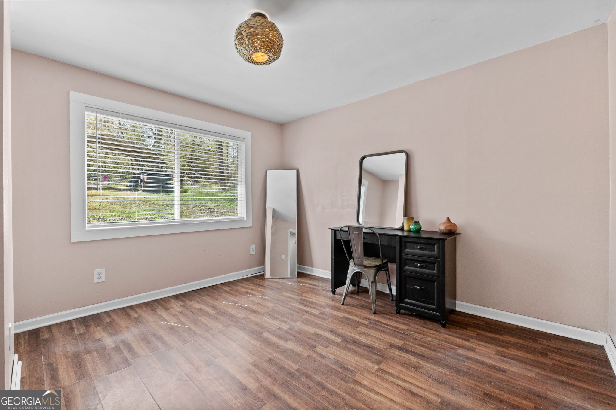 532 Henry Higgins Road Jackson, GA 30233 - Photo 19 of 46 a view of a workspace with furniture and a window