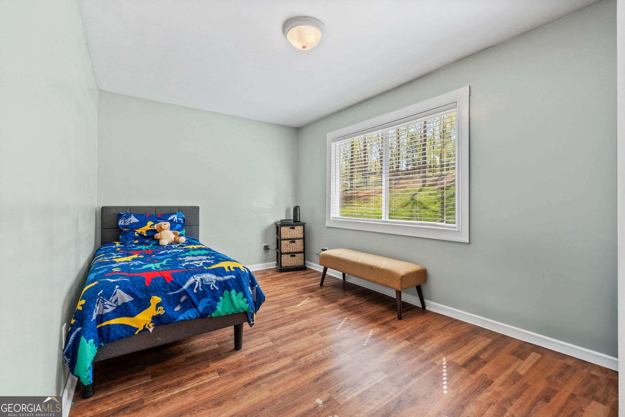 532 Henry Higgins Road Jackson, GA 30233 - Photo 21 of 46 a bedroom with bed and a window