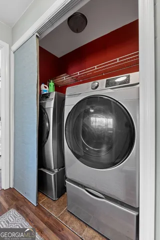 a utility room with dryer and washer