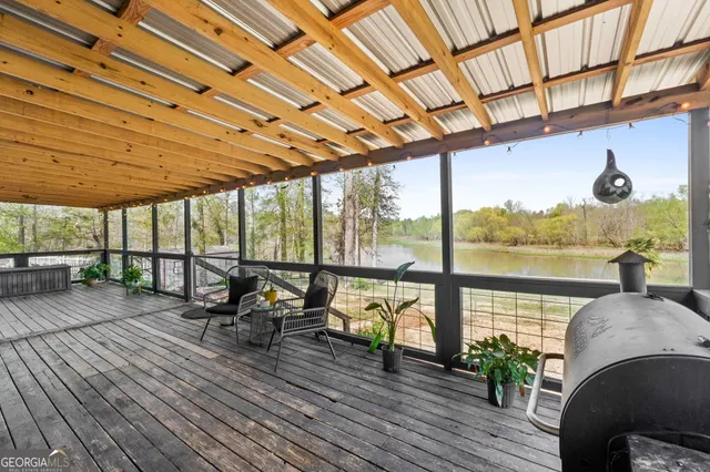 a living room with large windows