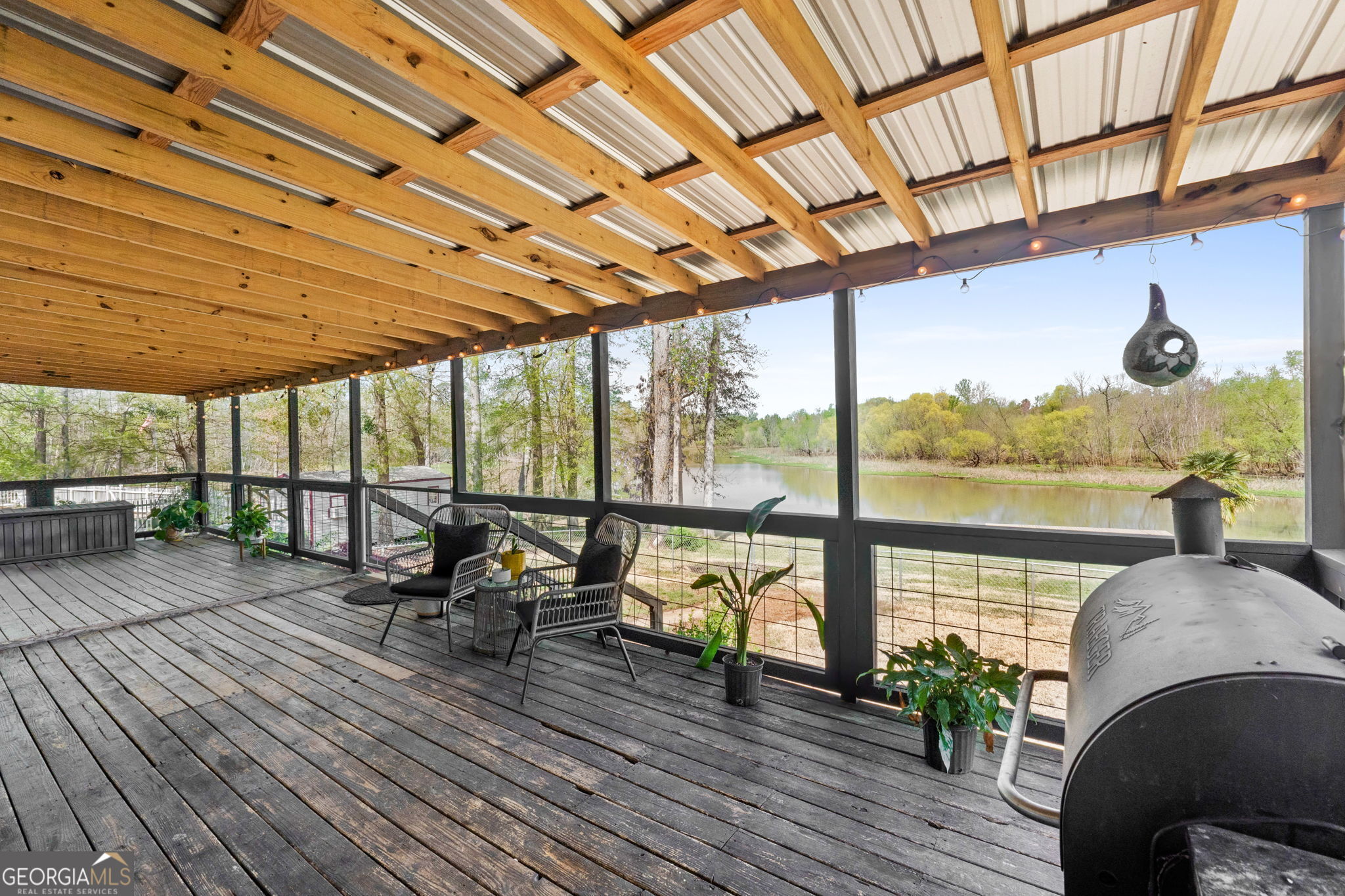 532 Henry Higgins Road Jackson, GA 30233 - Photo 25 of 46 a living room with large windows