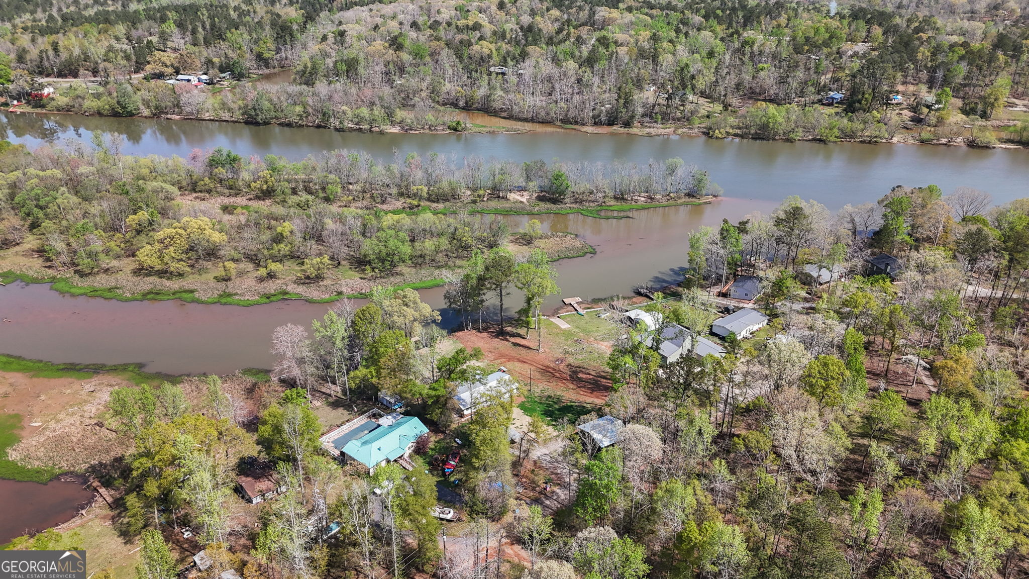 532 Henry Higgins Road Jackson, GA 30233 - Photo 36 of 46 an aerial view of a houses with outdoor space and lake view