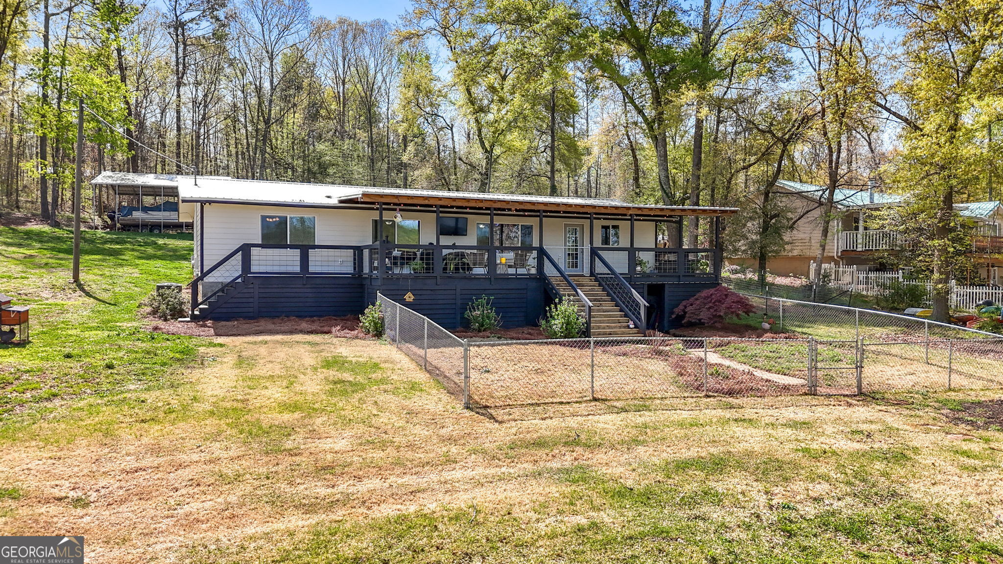 532 Henry Higgins Road Jackson, GA 30233 - Photo 46 of 46 a view of house with backyard and swimming pool