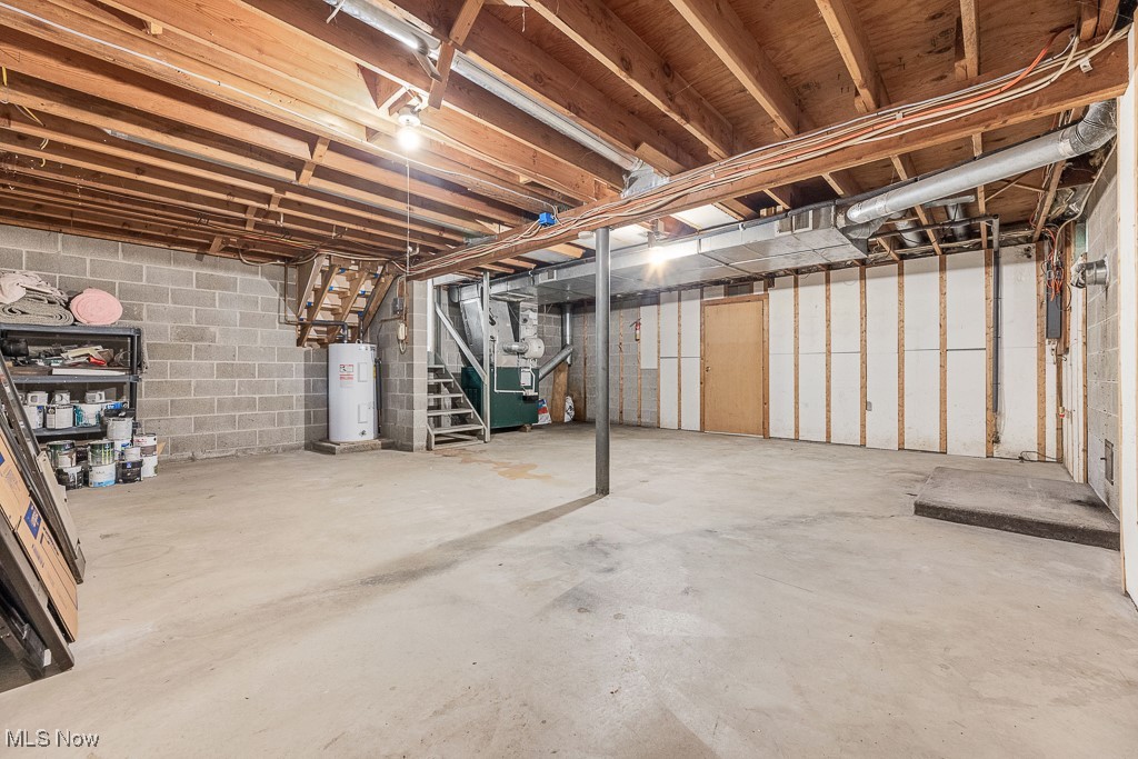 3166 Work Road Ravenna, OH 44266 - Photo 27 of 48 Basement with water heater and heating unit