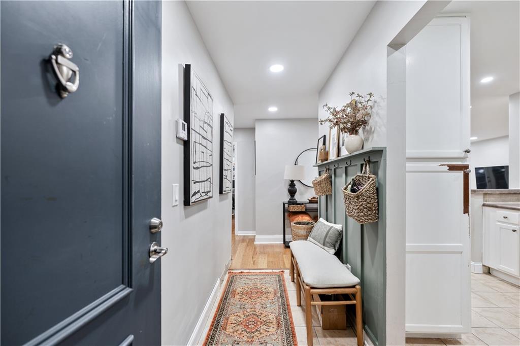 3650 Ashford Dunwoody Road Northeast, Unit 1026 Atlanta, GA 30319 - Photo 9 of 28 a very nice looking room with a chandelier