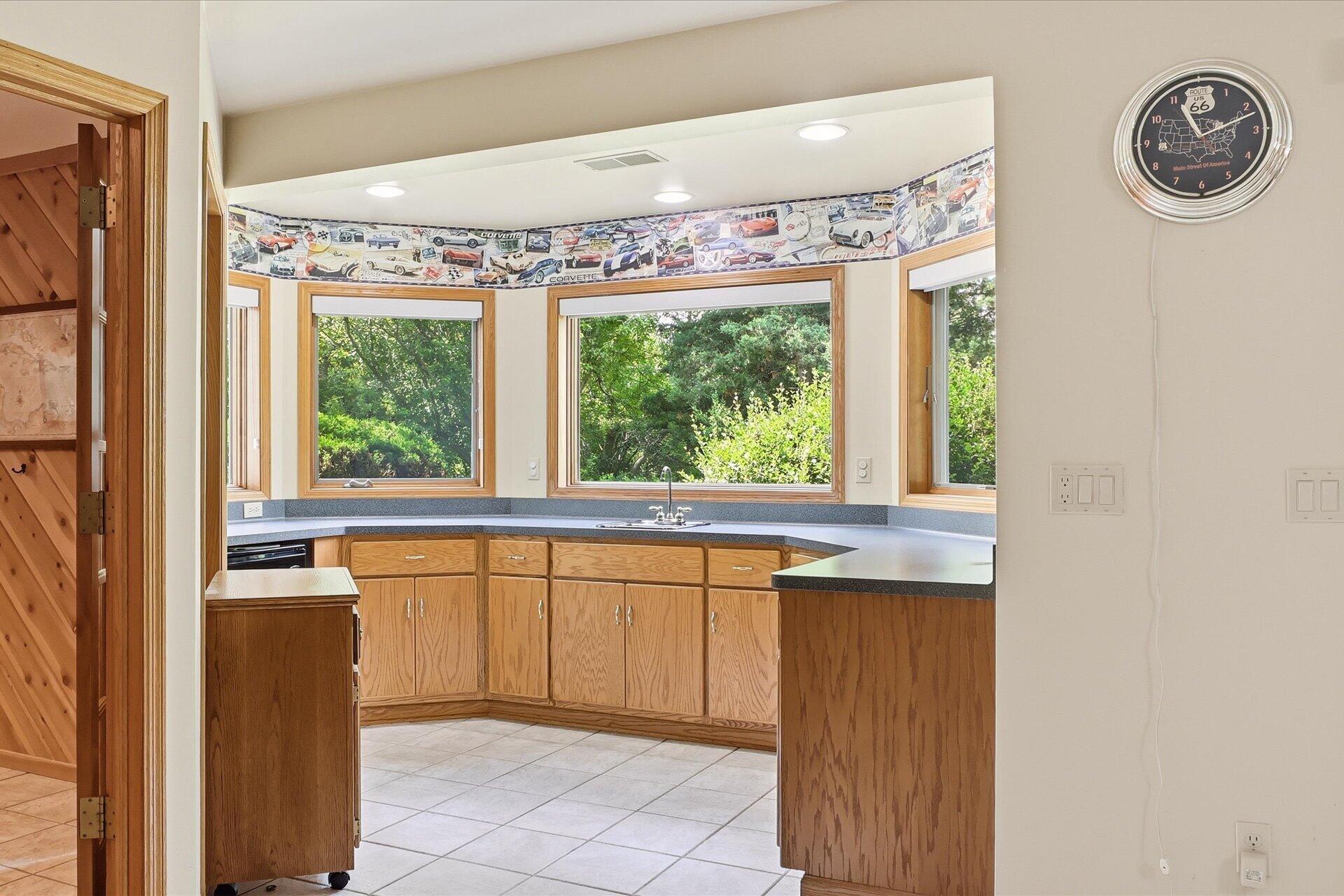 W330-s1417 County Rd C Delafield, WI 53018 - Photo 30 of 39 Lots of storage in this sunny kitchenette