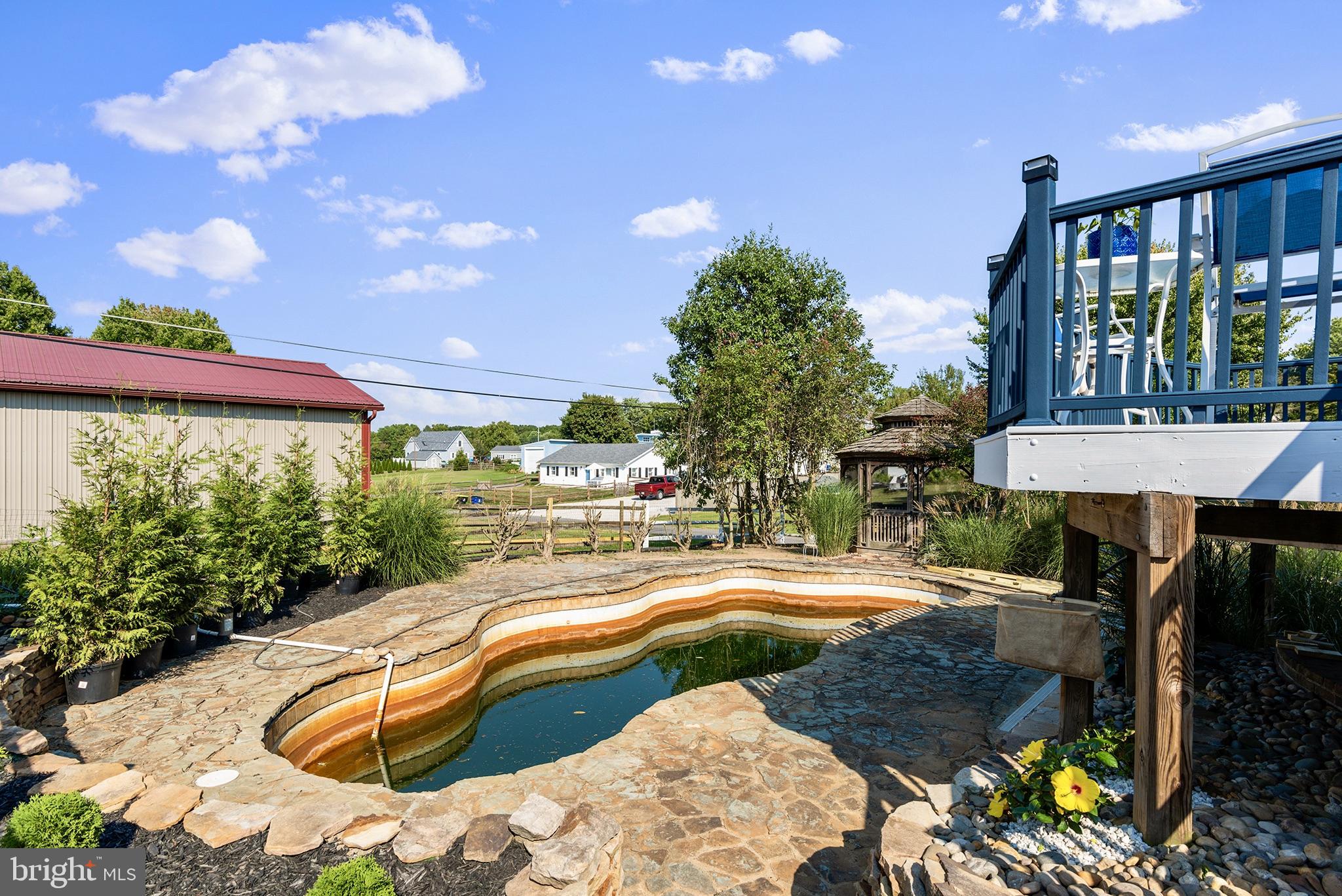 33 Low Road Earleville, MD 21919 - Photo 31 of 35 a swimming pool view with a seating space