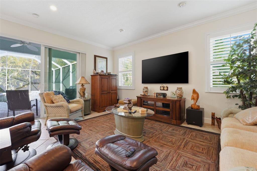 200 Capstan Drive Placida, FL 33946 - Photo 18 of 86 a living room with furniture and a flat screen tv