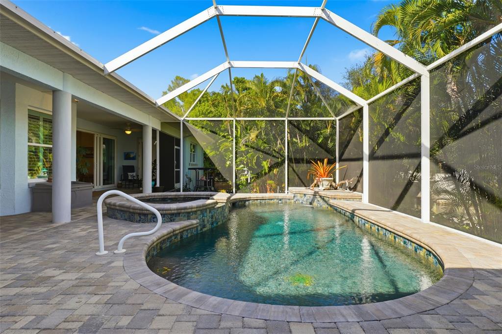 200 Capstan Drive Placida, FL 33946 - Photo 38 of 86 a view of a swimming pool with a lounge chair