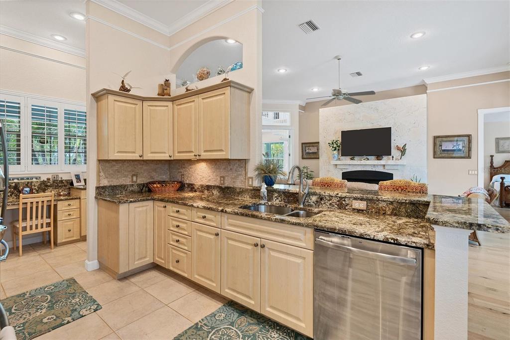 200 Capstan Drive Placida, FL 33946 - Photo 43 of 86 a kitchen with stainless steel appliances granite countertop a sink stove and cabinets