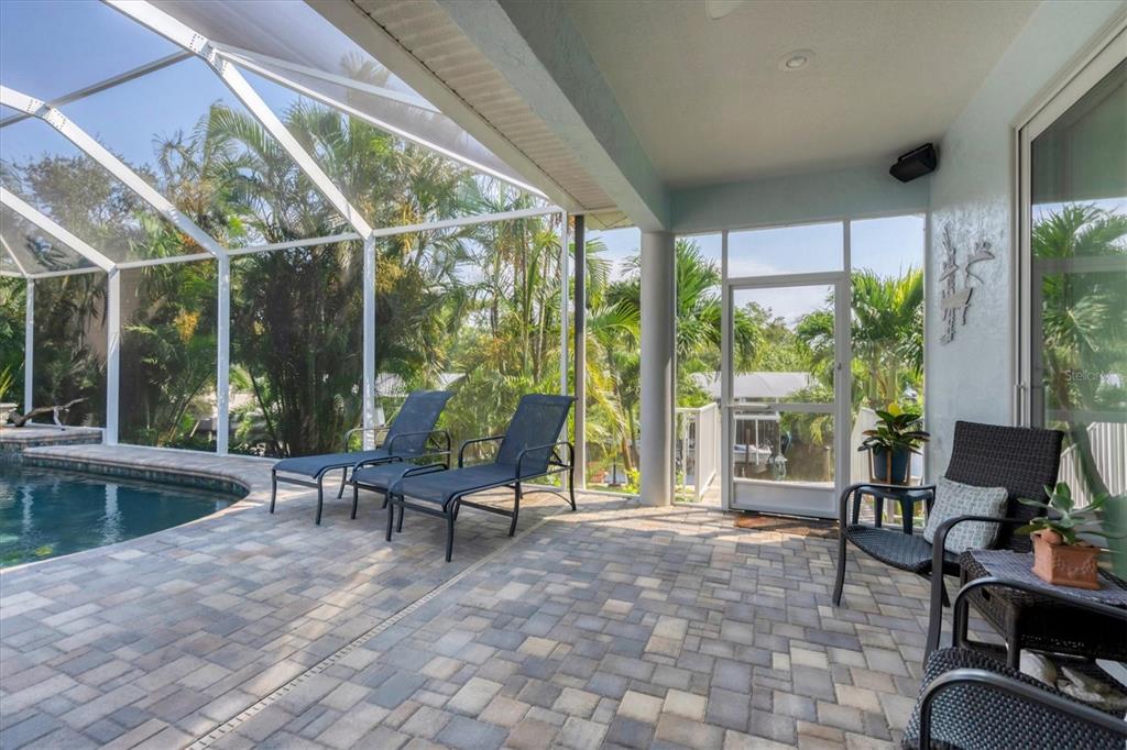 200 Capstan Drive Placida, FL 33946 - Photo 60 of 86 a living room with furniture and floor to ceiling windows