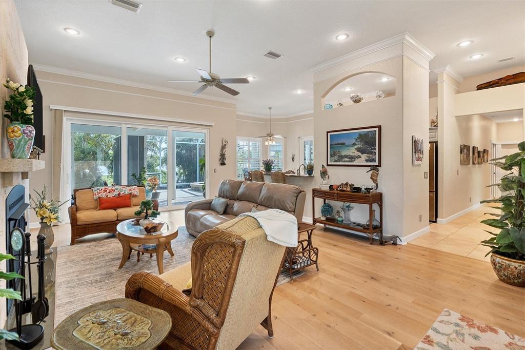 200 Capstan Drive Placida, FL 33946 - Photo 7 of 86 a living room with furniture a ceiling fan and a large window