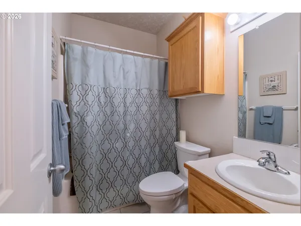 a bathroom with sink and mirror