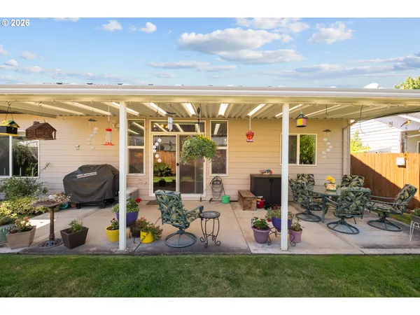 a view of a backyard with garden