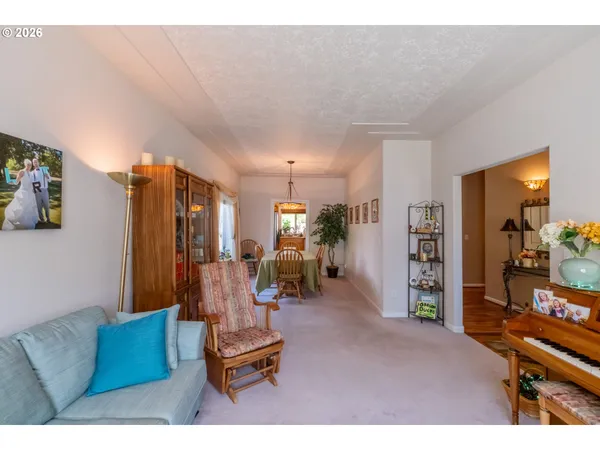 a view of living room and dining room