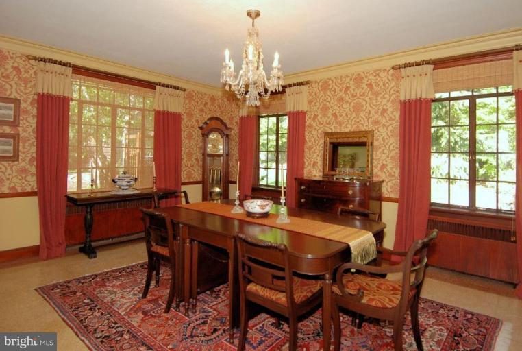 2000 Russell Road Alexandria, VA 22301 - Photo 2 of 30 a dining room with furniture a chandelier and a rug