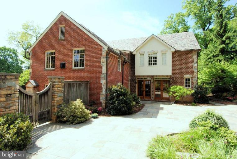 2000 Russell Road Alexandria, VA 22301 - Photo 24 of 30 a front view of a house with a yard and potted plants