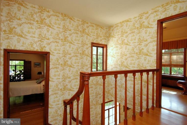2000 Russell Road Alexandria, VA 22301 - Photo 30 of 30 a view of staircase with railing and a chandelier