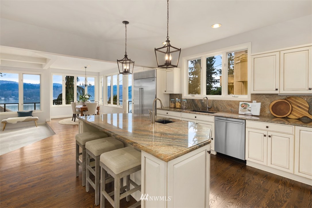 5648 East Mercer Way Mercer Island, WA 98040 - Photo 11 of 26 a kitchen with sink stove and cabinets