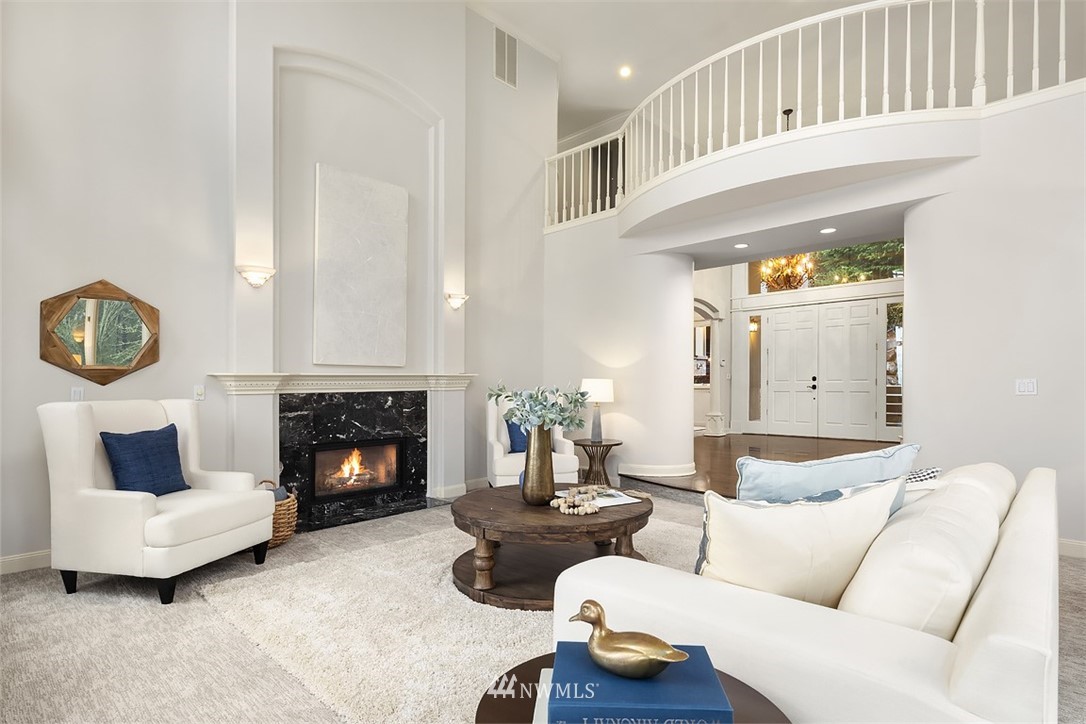 5648 East Mercer Way Mercer Island, WA 98040 - Photo 6 of 26 a living room with furniture and a fireplace