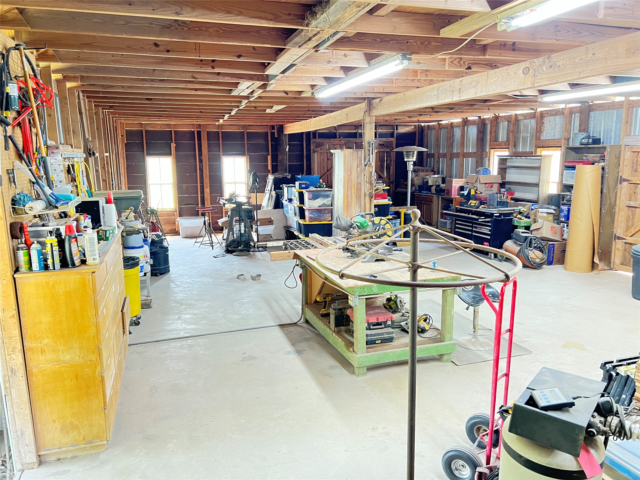 2421 Post Oak Road Webberville, TX 78653 - Photo 29 of 36 Interior workshop
