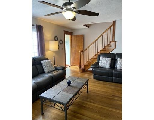 103 Chicago Street Fall River, MA 02721 - Photo 14 of 39 a living room with furniture and a wooden floor