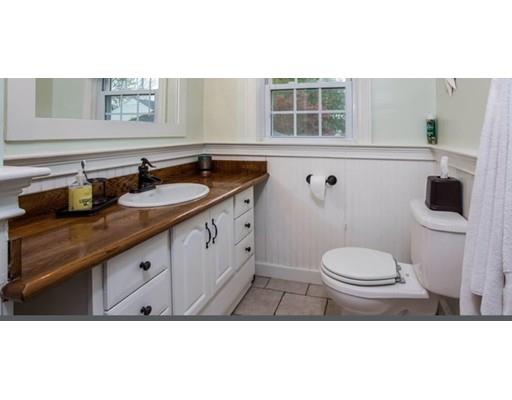 103 Chicago Street Fall River, MA 02721 - Photo 16 of 39 a bathroom with a sink a toilet and shower