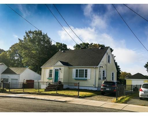 103 Chicago Street Fall River, MA 02721 - Photo 2 of 39 a front view of a house with a yard
