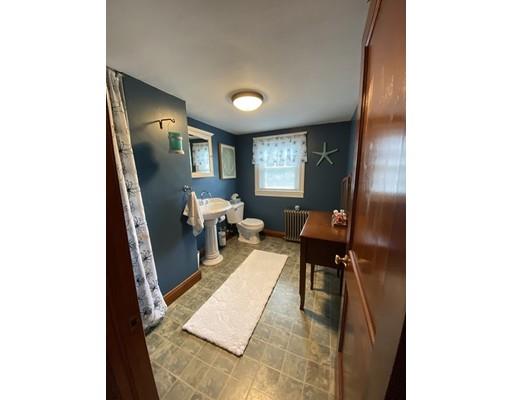 103 Chicago Street Fall River, MA 02721 - Photo 24 of 39 a living room with furniture and a wooden floor