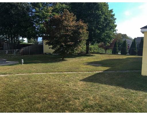103 Chicago Street Fall River, MA 02721 - Photo 28 of 39 a view of a field of grass and trees