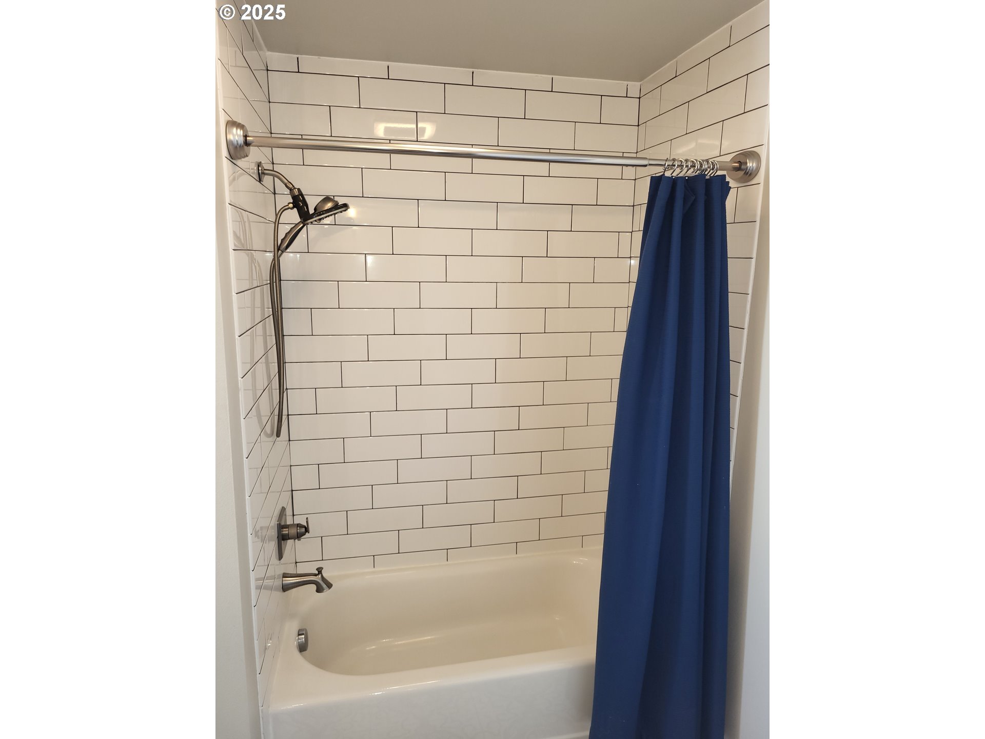 23538 Northwest St Helens Road, Unit S5 Portland, OR 97231 - Photo 24 of 48 a bathroom with a shower and a bath tub