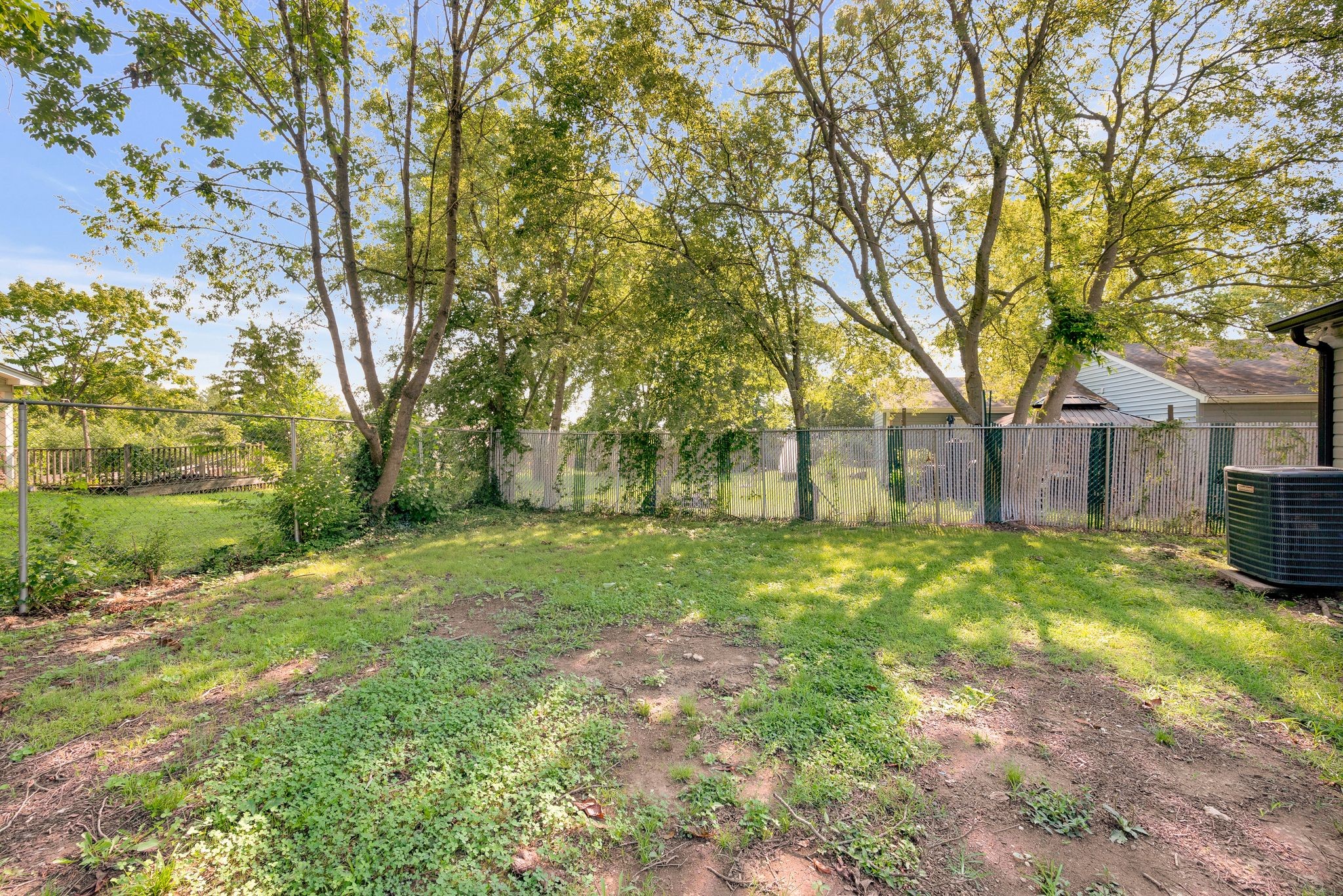 213 Manzano Road Madison, TN 37115 - Photo 20 of 24 a view of a yard with plants and trees