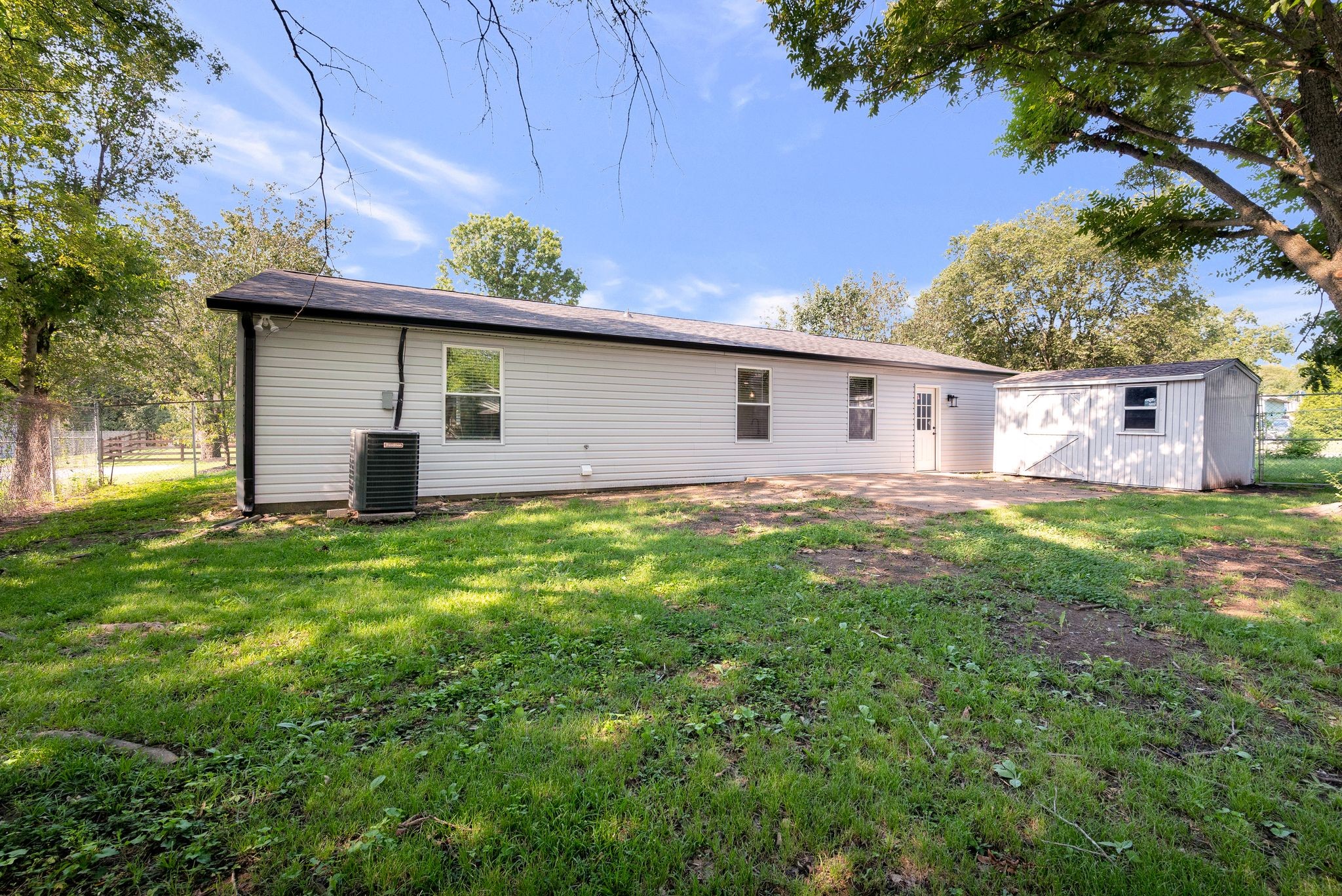213 Manzano Road Madison, TN 37115 - Photo 21 of 24 a view of a house with a yard