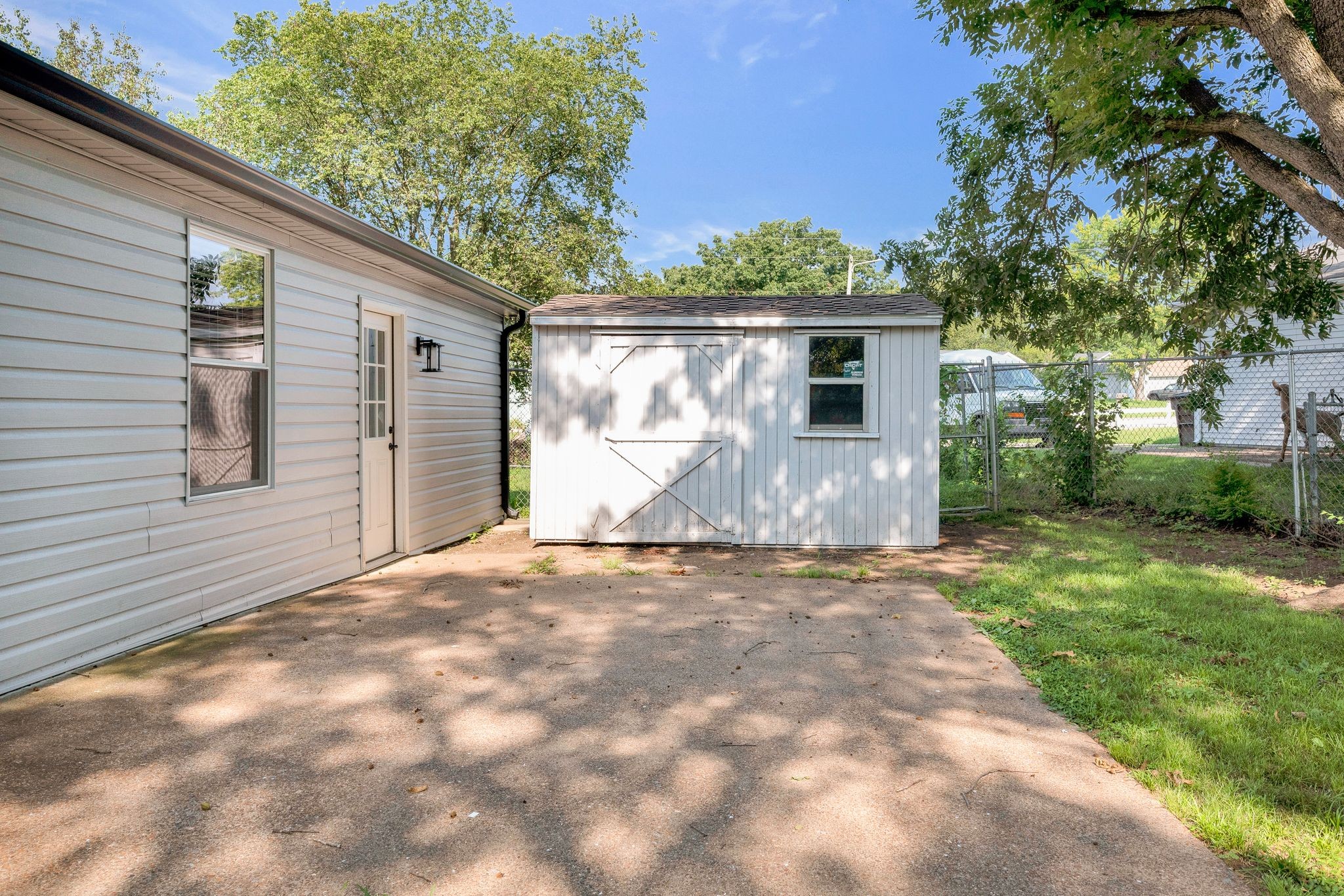 213 Manzano Road Madison, TN 37115 - Photo 23 of 24 a backyard of a house with garage