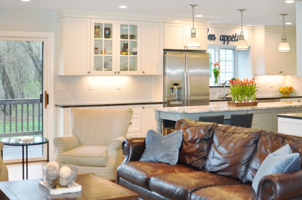 23 Wright Farm, Unit 23 Concord, MA 01742 - Photo 15 of 30 a dining room with furniture and a kitchen view