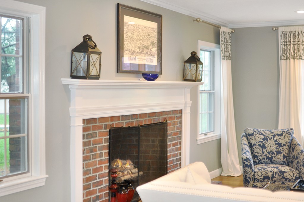 23 Wright Farm, Unit 23 Concord, MA 01742 - Photo 4 of 30 a living room with furniture a window and a fireplace