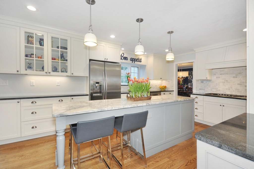 23 Wright Farm, Unit 23 Concord, MA 01742 - Photo 10 of 30 a kitchen with a refrigerator a sink and cabinets