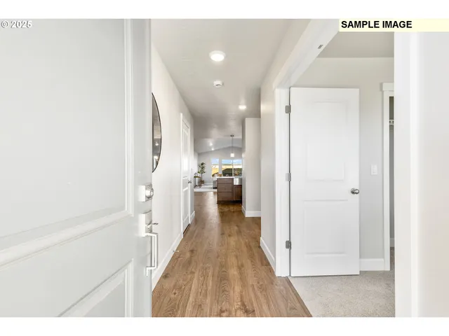 a hallway with a wooden floor