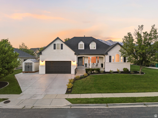 6242 Apollo Way Highland, UT 84003 - Photo 4 of 47 Contemporary residence with a dark shingle roof and white painted brick and siding