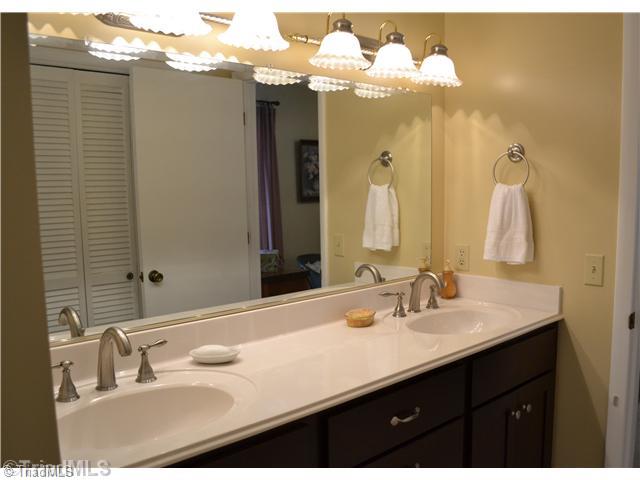 1809 Dantzler Road High Point, NC 27265 - Photo 13 of 16 Master Bath/Spa. The master bath is also updated - complete with dual sinks and a walk in shower!