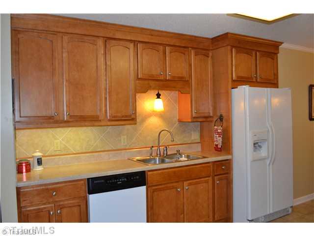 1809 Dantzler Road High Point, NC 27265 - Photo 6 of 16 Kitchen. This is just half of the large kitchen! New cabinets, tile backsplash and under cabinet lighting!
