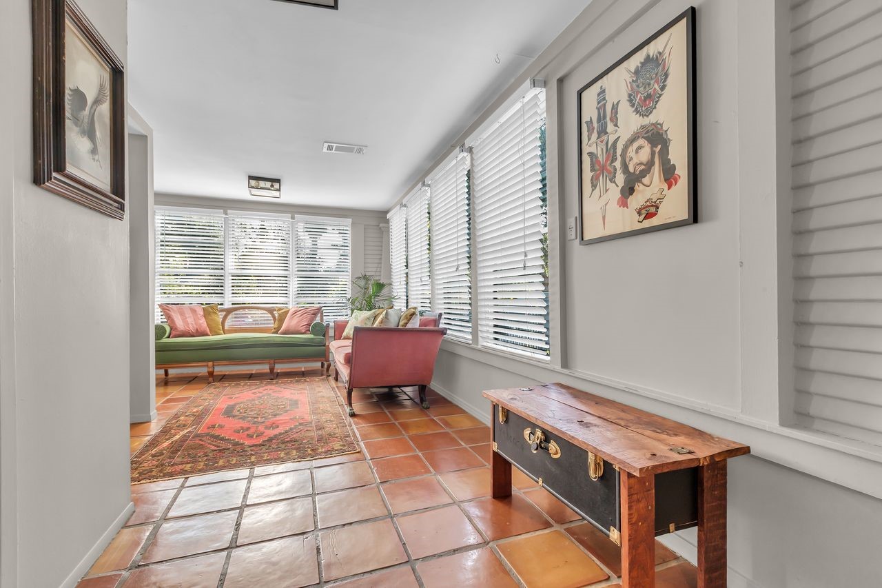 2608 Hopkins Street Houston, TX 77006 - Photo 16 of 42 a living room with furniture and a window