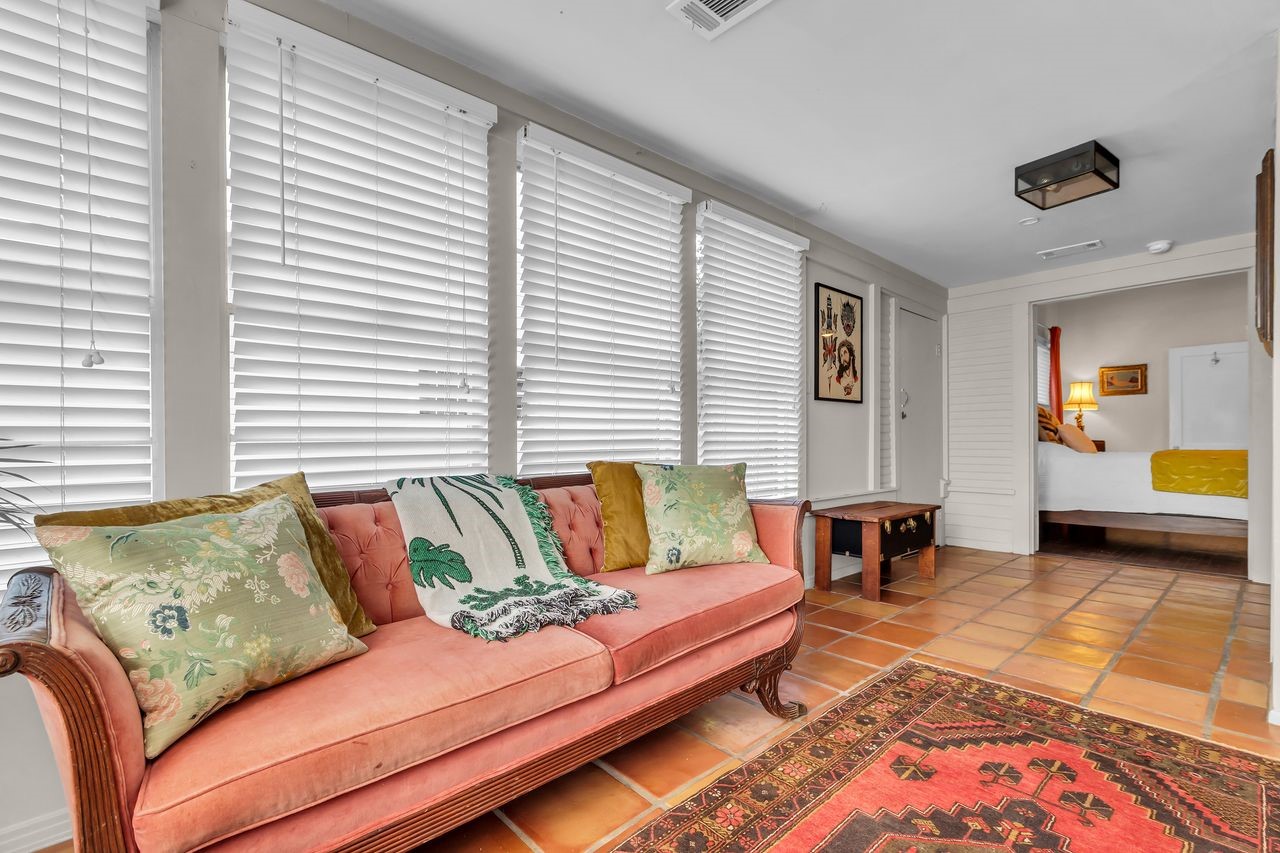2608 Hopkins Street Houston, TX 77006 - Photo 17 of 42 a bedroom with furniture and a window