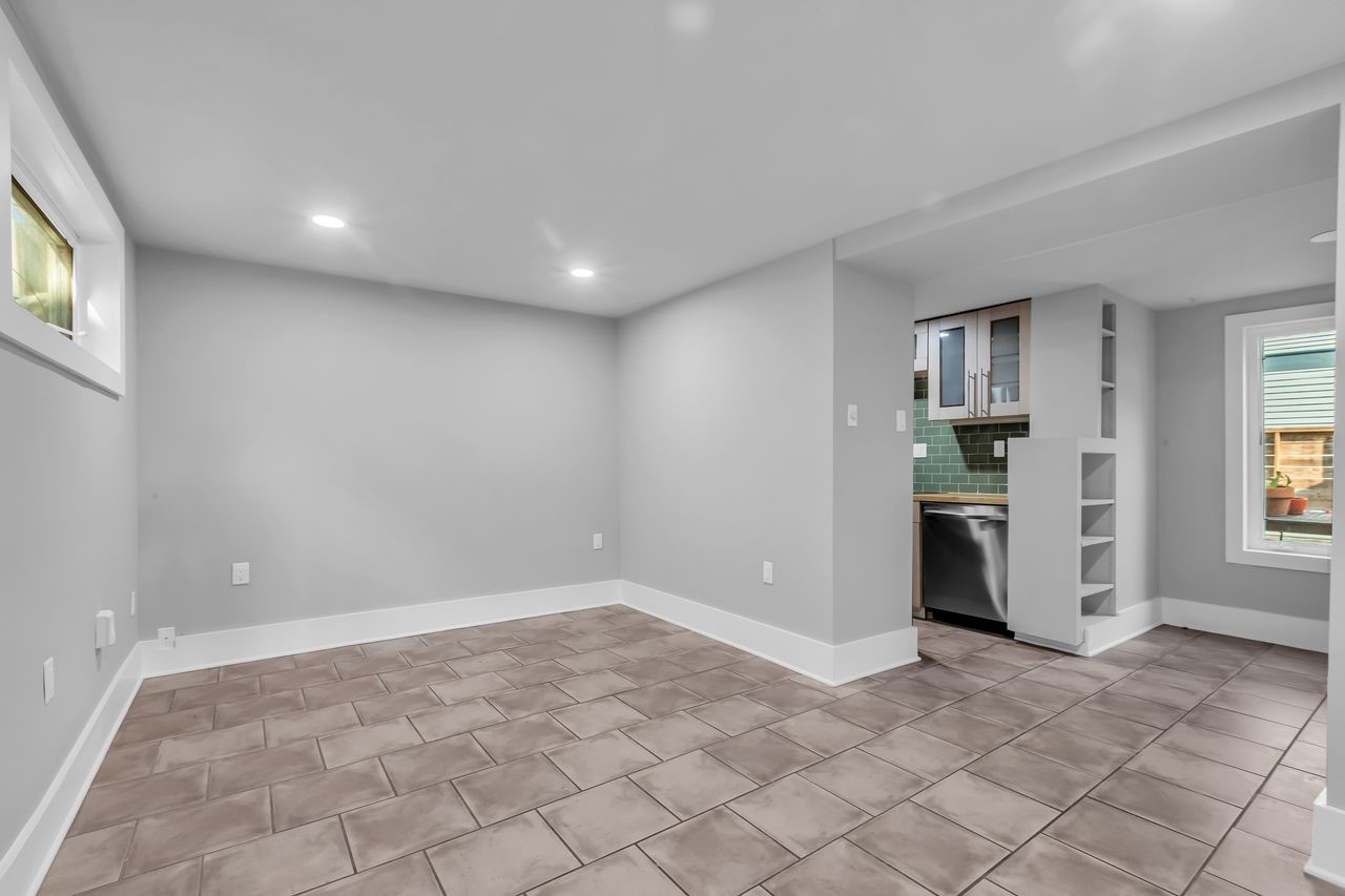 2608 Hopkins Street Houston, TX 77006 - Photo 29 of 42 a view of a kitchen with a sink and a refrigerator