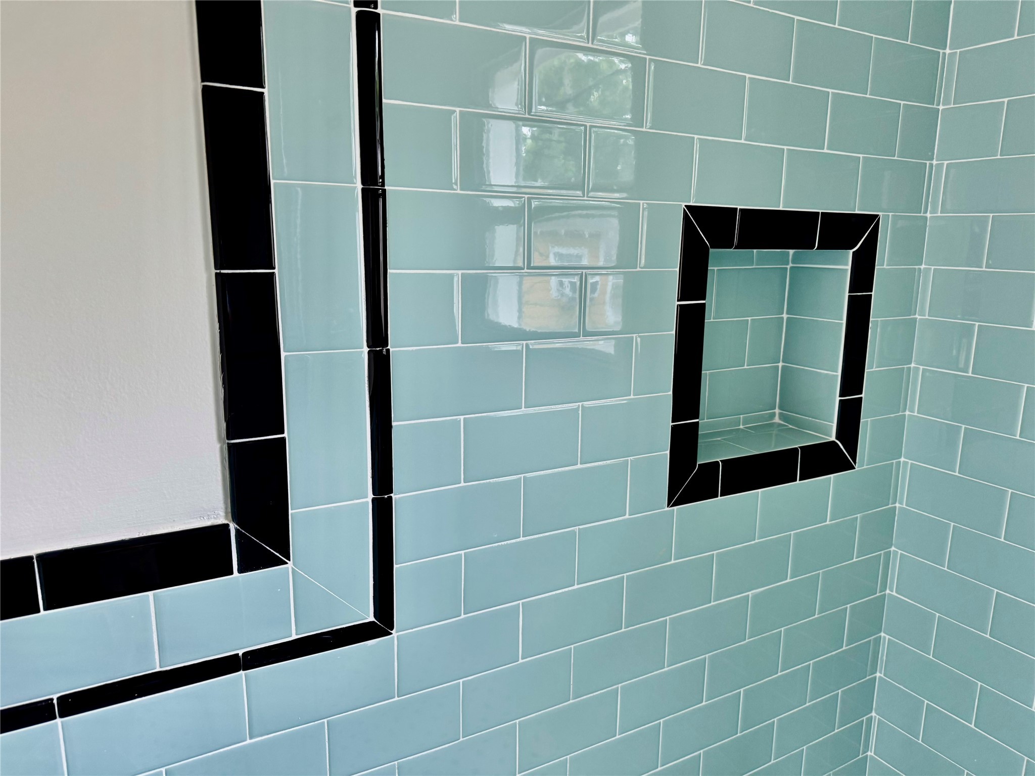 2608 Hopkins Street Houston, TX 77006 - Photo 35 of 42 a bathroom with a shower and a mirror